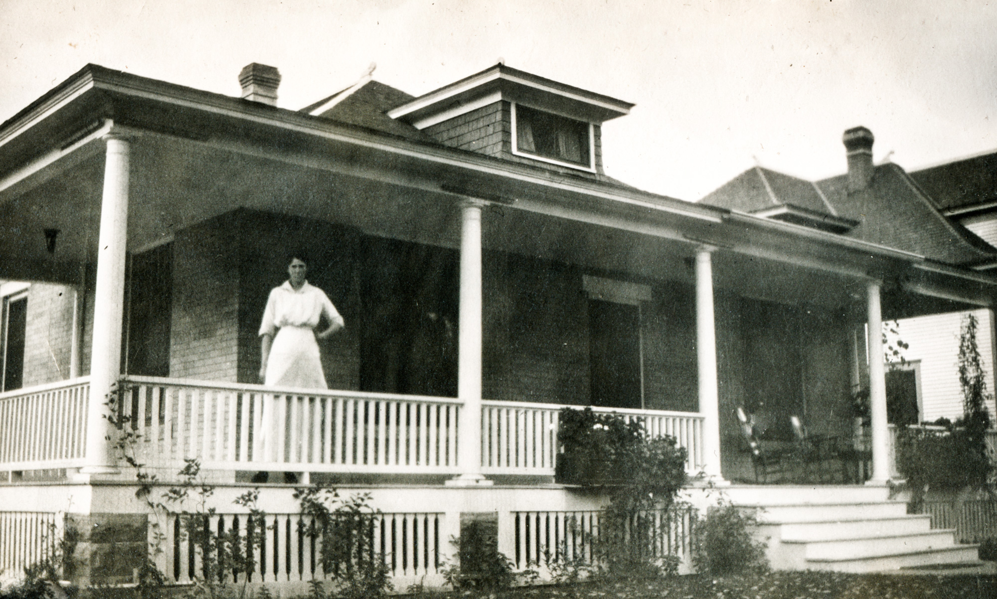 Dauth Family Archive - Florence Yeaton Standing on Porch